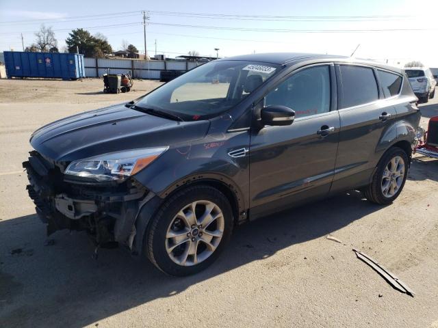 Ford Escape tit (2015)
